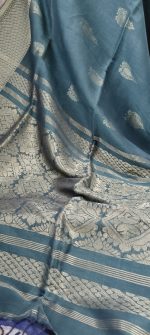 Linen saree with green base with embroidery feature - Image 2